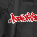 Black Windbreaker with ArtOfficialFlavor Tag